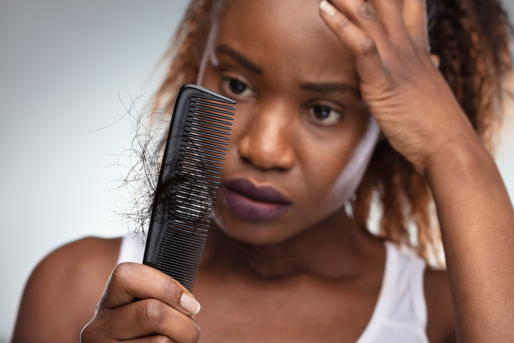 Which vitamin deficiency causes hair loss